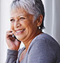 Woman smiling while on phone 